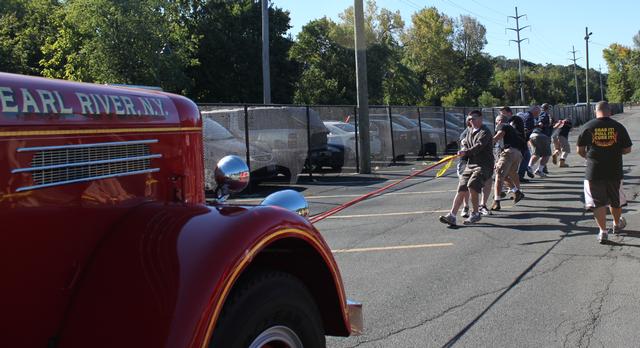 3rd Annual Fire Truck pull for Breast Cancer 9-23-2012. Won by Nanuet  Fire Department in 17.02 seconds,
Photo By Vincent P. Tuzzolino